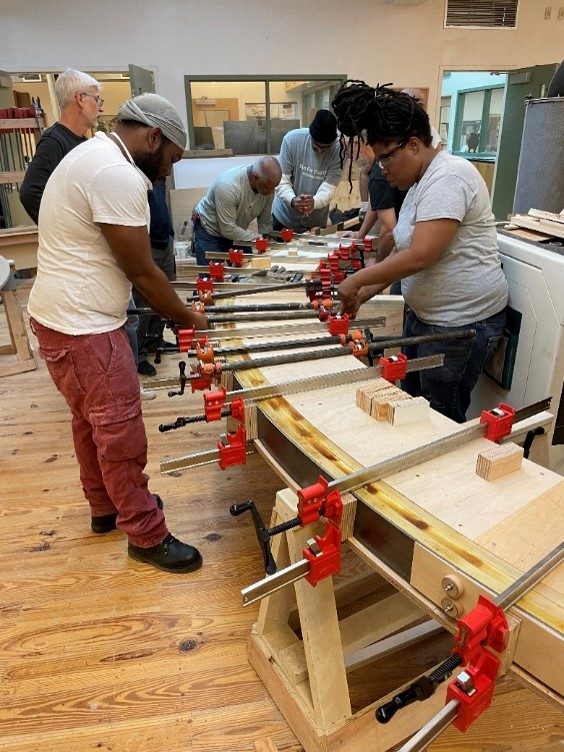 people building a bench